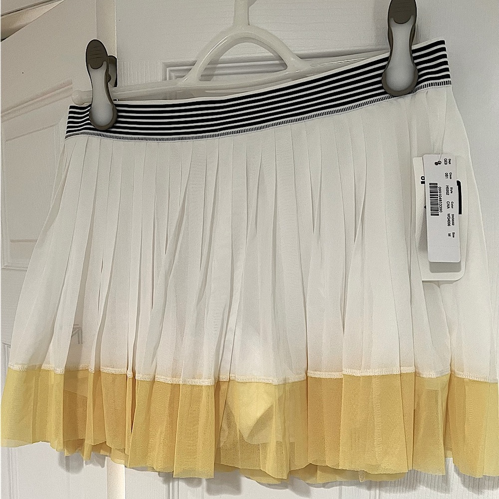 New balance x j crew tennis skort, yellow, white and blue. Pleated. New with tag